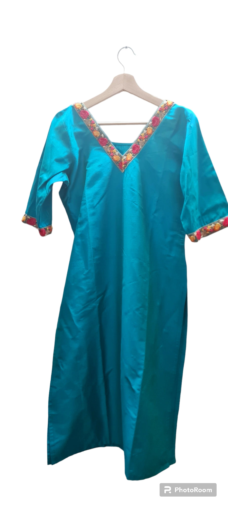 A Splash of Elegance: Blue Kurti and Bottom Set with Embroidered Neck and Sleeve Detail