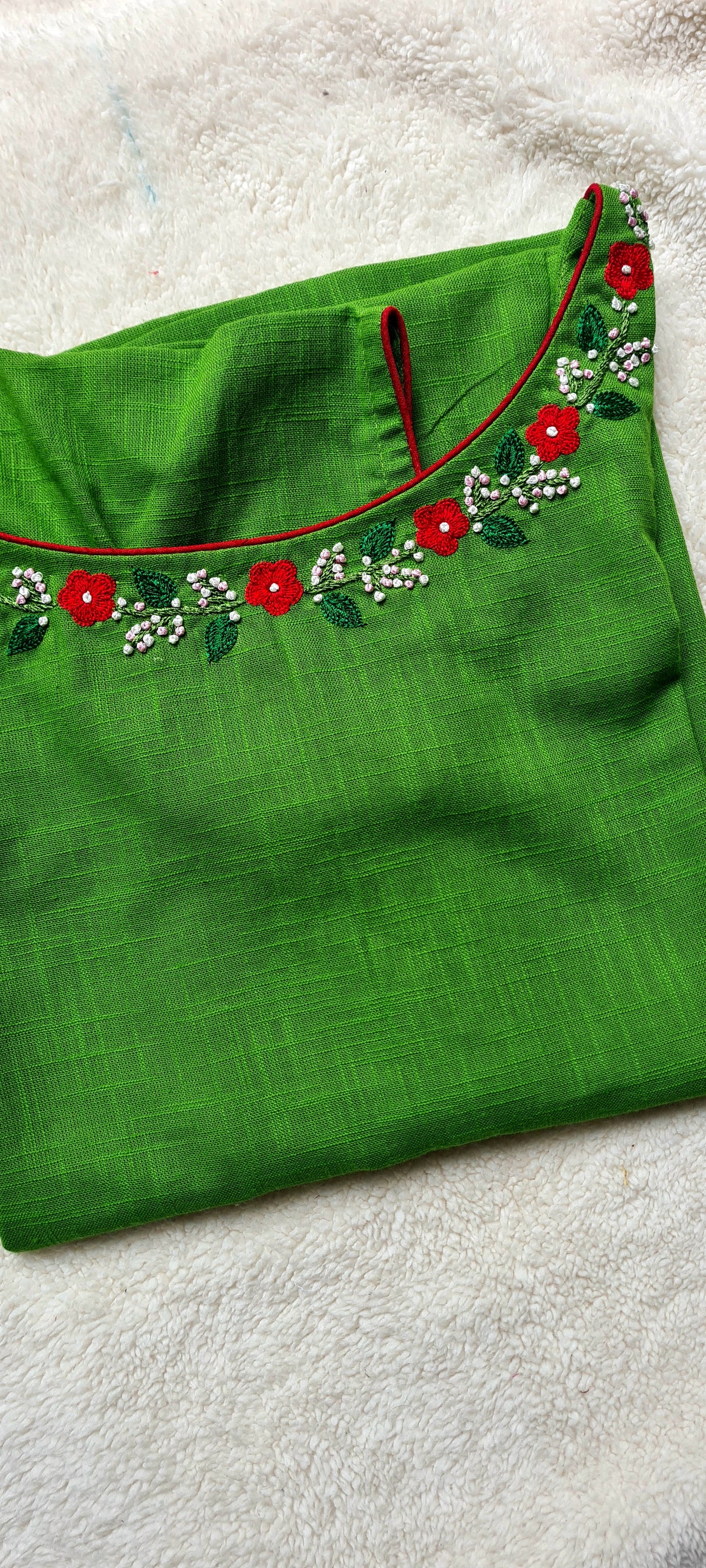 Floral Elegance: Pure Cotton Kurti with Hand Embroidery..