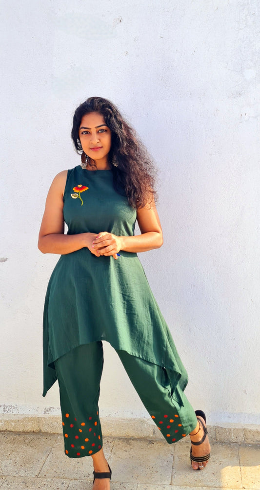 Emerald Bloom: Hand-Embroidered Halter Kurti And Bottom with Artful Accents